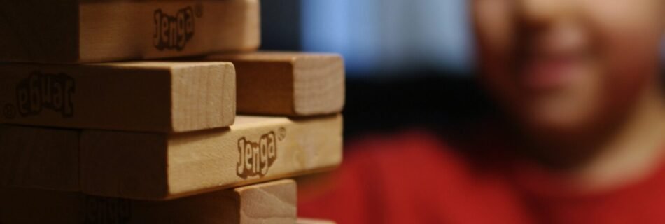 boy in red and black crew neck shirt
