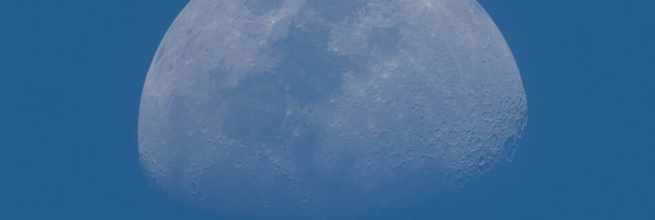 full moon in blue sky